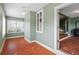 Bright sun room with mosaic tile flooring and large windows, providing ample natural light at 501 Sheridan Blvd, Orlando, FL 32804