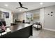 Well-lit office featuring a modern desk, neutral walls, contemporary decor, and a ceiling fan at 5150 Old Howell Branch Rd, Winter Park, FL 32792