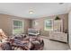 Spacious bedroom with twin beds and neutral decor offers a comfortable retreat at 5203 Pineview Way, Apopka, FL 32703