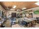 Large workshop area, equipped with woodworking tools and ample workspace at 5203 Pineview Way, Apopka, FL 32703