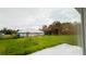Expansive backyard view showcasing lush greenery and potential for outdoor enjoyment at 656 Marion Oaks Mnr, Ocala, FL 34473