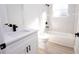 A modern bathroom with a white vanity, quartz countertop, and a shower-tub combination at 656 Marion Oaks Mnr, Ocala, FL 34473