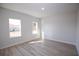 Spacious bedroom featuring two large windows at 656 Marion Oaks Mnr, Ocala, FL 34473