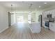 Modern kitchen featuring a center island, stainless steel appliances, and open floor plan at 656 Marion Oaks Mnr, Ocala, FL 34473