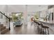 Open concept home featuring living, dining, and kitchen spaces at 8852 Sperry St, Orlando, FL 32827