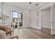 Open office space with French doors, contemporary decor, and comfortable seating area at 8852 Sperry St, Orlando, FL 32827
