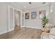Inviting office space featuring hardwood floors, light grey walls, and french doors at 8852 Sperry St, Orlando, FL 32827