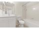 Bright bathroom featuring tub/shower combo, vanity with shaker cabinets, and updated fixtures at 10608 Savannah Plantation Ct, Orlando, FL 32832