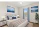 This bedroom features a large bed, stylish decor, and a peaceful ambiance at 10608 Savannah Plantation Ct, Orlando, FL 32832