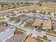 The aerial view highlights the neighborhood's layout and proximity to green spaces at 130 Bloomingdale Dr, Davenport, FL 33897