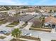 This aerial view shows the well-maintained lawns and landscaping of the neighborhood at 130 Bloomingdale Dr, Davenport, FL 33897