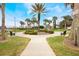 Inviting community park featuring benches, a gazebo, walking paths, and lush landscaping for relaxation and recreation at 130 Bloomingdale Dr, Davenport, FL 33897