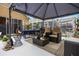 Relaxing patio with outdoor seating, perfect for entertaining in style at 130 Bloomingdale Dr, Davenport, FL 33897
