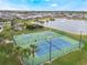 Well-maintained tennis and basketball courts in a vibrant community setting with lush landscaping at 130 Bloomingdale Dr, Davenport, FL 33897