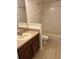 Bathroom features a vanity with sink, a toilet and tiled flooring, creating a functional space at 1309 Heritage Commons Dr, Winter Springs, FL 32708