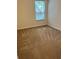 Bedroom with neutral carpeting and natural light from the window, providing a calm atmosphere at 1309 Heritage Commons Dr, Winter Springs, FL 32708