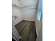 Walk-in closet with modern flooring, window, and shelving for ample storage space at 1309 Heritage Commons Dr, Winter Springs, FL 32708