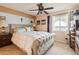 Comfortable bedroom with plush bed, ample natural light, and serene water views at 145 N Halifax Ave # 211, Daytona Beach, FL 32118