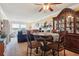 Dining area with decorative china cabinet and view of the water from the lanai at 145 N Halifax Ave # 211, Daytona Beach, FL 32118