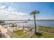 Scenic water view from the community featuring a pool, and a pier at 145 N Halifax Ave # 211, Daytona Beach, FL 32118