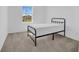Bedroom with carpet, one window with a view, and a standard-size bed frame at 1620 Pelican Dr, Davenport, FL 33896