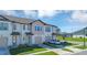 Attractive two-story townhome features a one-car garage and well-maintained lawn at 1620 Pelican Dr, Davenport, FL 33896