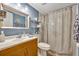 Bathroom with a vanity, toilet, and shower at 185 Scottsdale Sq # 185, Winter Park, FL 32792