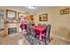 Dining room with a fireplace and open view to the kitchen at 185 Scottsdale Sq # 185, Winter Park, FL 32792