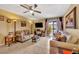 Comfortable living room with neutral decor and a sliding glass door to the outside at 185 Scottsdale Sq # 185, Winter Park, FL 32792