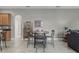 Breakfast nook with seating, stainless appliances, granite countertops, and tile floors at 2829 Autumn Breeze Way, Kissimmee, FL 34744