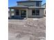 Back of home featuring covered patio with view of a dirt backyard at 3165 Cup Dr, Lakeland, FL 33803