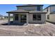 Back of home featuring covered patio with view of a dirt backyard at 3165 Cup Dr, Lakeland, FL 33803