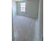 Cozy bedroom with a window providing natural light, ideal for creating a relaxing retreat at 3165 Cup Dr, Lakeland, FL 33803