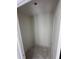 A walk-in closet with light fixture and door at 3165 Cup Dr, Lakeland, FL 33803