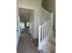 Inviting entryway showcasing a staircase and an open floor plan, great for welcoming guests at 3165 Cup Dr, Lakeland, FL 33803