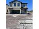 Charming two-story home with a garage and neutral color palette offers great curb appeal at 3165 Cup Dr, Lakeland, FL 33803
