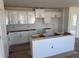 Bright kitchen with white cabinets, providing ample storage space for all your culinary needs at 3165 Cup Dr, Lakeland, FL 33803