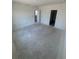 Bright living room featuring neutral walls, offering versatility for customization and decor at 3165 Cup Dr, Lakeland, FL 33803