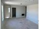 Open living space with a fireplace and an open floor plan, perfect for entertaining at 3165 Cup Dr, Lakeland, FL 33803
