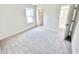 Bright bedroom with carpet, a window, and a closet at 3171 Cup Dr, Lakeland, FL 33803