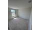 Unfinished bedroom with a window, great natural light at 3171 Cup Dr, Lakeland, FL 33803
