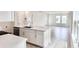 Open-concept kitchen with a large island, stainless steel appliances, and plenty of counterspace at 3171 Cup Dr, Lakeland, FL 33803