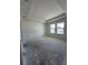 Spacious unfinished main bedroom with tray ceiling and abundant natural light at 3171 Cup Dr, Lakeland, FL 33803