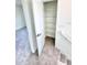 View of the closet with wire shelving for organized storage on the landing near the stairs at 3171 Cup Dr, Lakeland, FL 33803