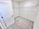 Bright walk-in closet equipped with ample wire shelving at 3171 Cup Dr, Lakeland, FL 33803