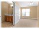 Bright bedroom featuring a vanity area, neutral walls and a plush carpet at 3176 Feltrim Pl # 205, Kissimmee, FL 34747
