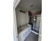 Bathroom featuring double sinks, a glass shower, and modern lighting at 3225 Cup Dr, Lakeland, FL 33803