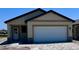 Charming one-story home featuring a two-car garage and neutral paint scheme at 3225 Cup Dr, Lakeland, FL 33803