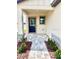 Inviting front porch with stone accents and manicured landscaping at 3225 Cup Dr, Lakeland, FL 33803