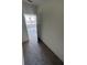 Hallway featuring neutral paint and grey carpet at 3225 Cup Dr, Lakeland, FL 33803
